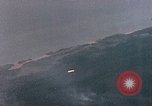 Image of Gun camera records U.S. Aircraft strafing targets on Okinawa in World  Okinawa Ryukyu Islands, 1945, second 20 stock footage video 65675040497