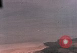 Image of Gun camera records U.S. Aircraft strafing targets on Okinawa in World  Okinawa Ryukyu Islands, 1945, second 23 stock footage video 65675040497
