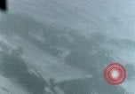 Image of U.S aircraft gun camera shows strafing of snow-covered targets in Japa Japan, 1945, second 9 stock footage video 65675040499