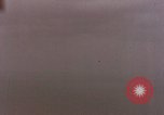 Image of U.S. fighter plane strafes lines of communication in Japan during Worl Japan, 1945, second 3 stock footage video 65675040502
