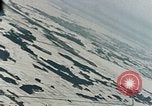 Image of U.S. fighter plane strafes lines of communication in Japan during Worl Japan, 1945, second 12 stock footage video 65675040502