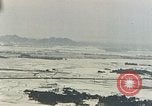 Image of U.S. fighter plane strafes lines of communication in Japan during Worl Japan, 1945, second 13 stock footage video 65675040502