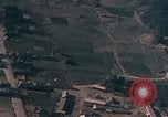 Image of U.S. fighter plane strafes lines of communication in Japan during Worl Japan, 1945, second 20 stock footage video 65675040502