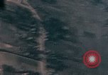 Image of U.S. fighter plane strafes lines of communication in Japan during Worl Japan, 1945, second 21 stock footage video 65675040502