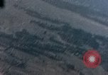 Image of U.S. fighter plane strafes lines of communication in Japan during Worl Japan, 1945, second 22 stock footage video 65675040502
