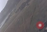 Image of U.S. fighter plane strafes lines of communication in Japan during Worl Japan, 1945, second 23 stock footage video 65675040502