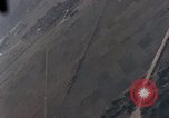 Image of U.S. fighter plane strafes lines of communication in Japan during Worl Japan, 1945, second 24 stock footage video 65675040502