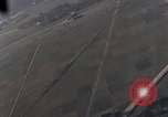 Image of U.S. fighter plane strafes lines of communication in Japan during Worl Japan, 1945, second 25 stock footage video 65675040502