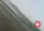 Image of U.S. fighter plane strafes lines of communication in Japan during Worl Japan, 1945, second 28 stock footage video 65675040502