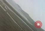 Image of U.S. fighter plane strafes lines of communication in Japan during Worl Japan, 1945, second 29 stock footage video 65675040502