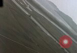 Image of U.S. fighter plane strafes lines of communication in Japan during Worl Japan, 1945, second 30 stock footage video 65675040502