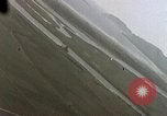 Image of U.S. fighter plane strafes lines of communication in Japan during Worl Japan, 1945, second 31 stock footage video 65675040502