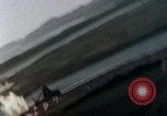 Image of U.S. fighter plane strafes lines of communication in Japan during Worl Japan, 1945, second 36 stock footage video 65675040502