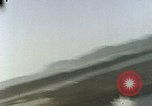 Image of U.S. fighter plane strafes lines of communication in Japan during Worl Japan, 1945, second 37 stock footage video 65675040502