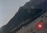 Image of U.S. fighter plane strafes lines of communication in Japan during Worl Japan, 1945, second 39 stock footage video 65675040502
