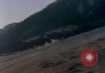 Image of U.S. fighter plane strafes lines of communication in Japan during Worl Japan, 1945, second 40 stock footage video 65675040502