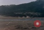 Image of U.S. fighter plane strafes lines of communication in Japan during Worl Japan, 1945, second 41 stock footage video 65675040502