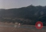 Image of U.S. fighter plane strafes lines of communication in Japan during Worl Japan, 1945, second 42 stock footage video 65675040502