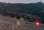 Image of U.S. fighter plane strafes lines of communication in Japan during Worl Japan, 1945, second 44 stock footage video 65675040502