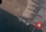 Image of U.S. fighter plane strafes lines of communication in Japan during Worl Japan, 1945, second 49 stock footage video 65675040502