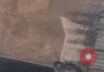 Image of U.S. fighter plane strafes lines of communication in Japan during Worl Japan, 1945, second 50 stock footage video 65675040502