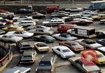 Image of New York City buildings and traffic New York City USA, 1970, second 58 stock footage video 65675040532