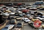 Image of New York City buildings and traffic New York City USA, 1970, second 59 stock footage video 65675040532