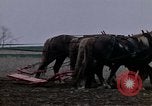 Image of Farmer plowing field New York United States USA, 1970, second 8 stock footage video 65675040534