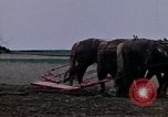 Image of Farmer plowing field New York United States USA, 1970, second 9 stock footage video 65675040534