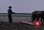 Image of Farmer plowing field New York United States USA, 1970, second 11 stock footage video 65675040534