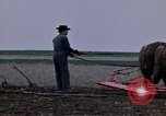 Image of Farmer plowing field New York United States USA, 1970, second 12 stock footage video 65675040534