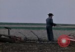 Image of Farmer plowing field New York United States USA, 1970, second 15 stock footage video 65675040534