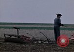 Image of Farmer plowing field New York United States USA, 1970, second 16 stock footage video 65675040534