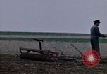Image of Farmer plowing field New York United States USA, 1970, second 17 stock footage video 65675040534