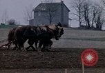 Image of Farmer plowing field New York United States USA, 1970, second 24 stock footage video 65675040534