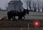 Image of Farmer plowing field New York United States USA, 1970, second 26 stock footage video 65675040534