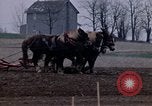 Image of Farmer plowing field New York United States USA, 1970, second 27 stock footage video 65675040534