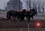 Image of Farmer plowing field New York United States USA, 1970, second 28 stock footage video 65675040534