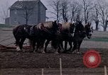Image of Farmer plowing field New York United States USA, 1970, second 29 stock footage video 65675040534