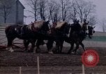 Image of Farmer plowing field New York United States USA, 1970, second 31 stock footage video 65675040534