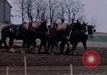 Image of Farmer plowing field New York United States USA, 1970, second 32 stock footage video 65675040534
