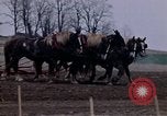 Image of Farmer plowing field New York United States USA, 1970, second 33 stock footage video 65675040534
