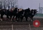 Image of Farmer plowing field New York United States USA, 1970, second 35 stock footage video 65675040534