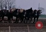 Image of Farmer plowing field New York United States USA, 1970, second 36 stock footage video 65675040534