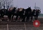 Image of Farmer plowing field New York United States USA, 1970, second 37 stock footage video 65675040534