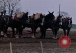 Image of Farmer plowing field New York United States USA, 1970, second 38 stock footage video 65675040534