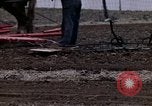 Image of Farmer plowing field New York United States USA, 1970, second 59 stock footage video 65675040534