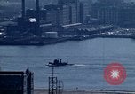 Image of Tugboat on Delaware River and Philadelphia scenes Philadelphia Pennsylvania USA, 1970, second 3 stock footage video 65675040535