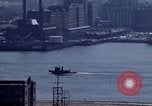 Image of Tugboat on Delaware River and Philadelphia scenes Philadelphia Pennsylvania USA, 1970, second 4 stock footage video 65675040535