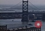 Image of Tugboat on Delaware River and Philadelphia scenes Philadelphia Pennsylvania USA, 1970, second 13 stock footage video 65675040535